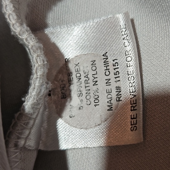 Romeo & Juliet Couture | Black and White Form Fitting Dress - Picture 5 of 8